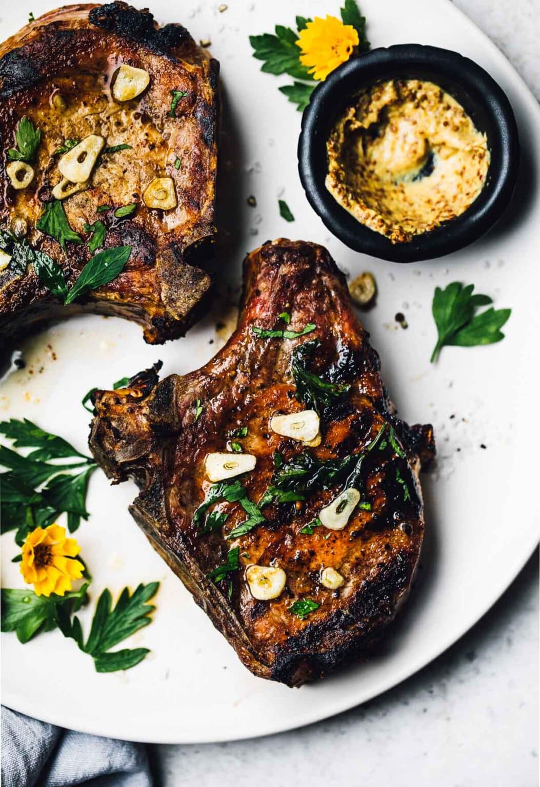 Grilled Bone-In Pork Chops with Garlic Butter • Heartbeet Kitchen