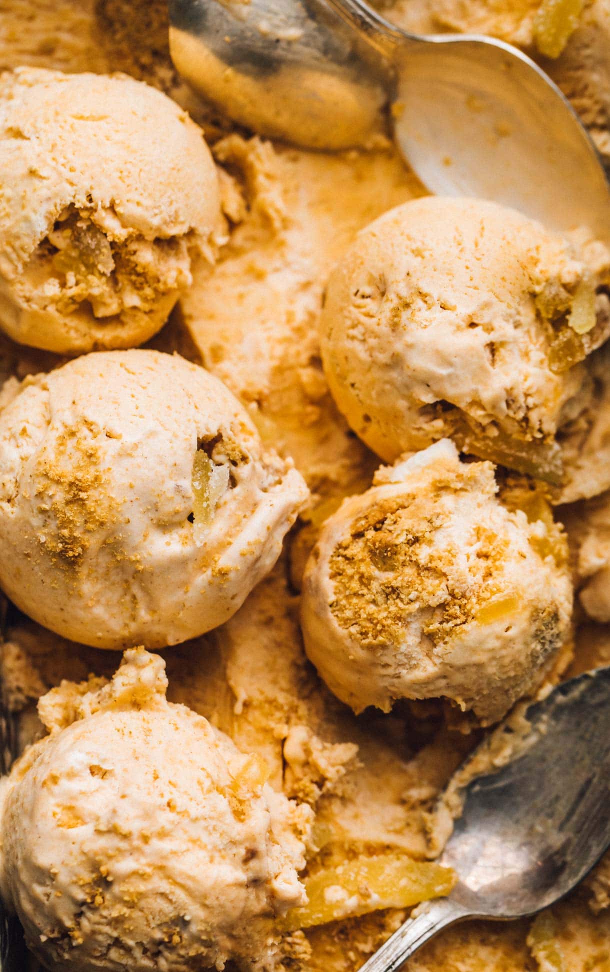 close up photo of scoops of pumpkin pie ice cream