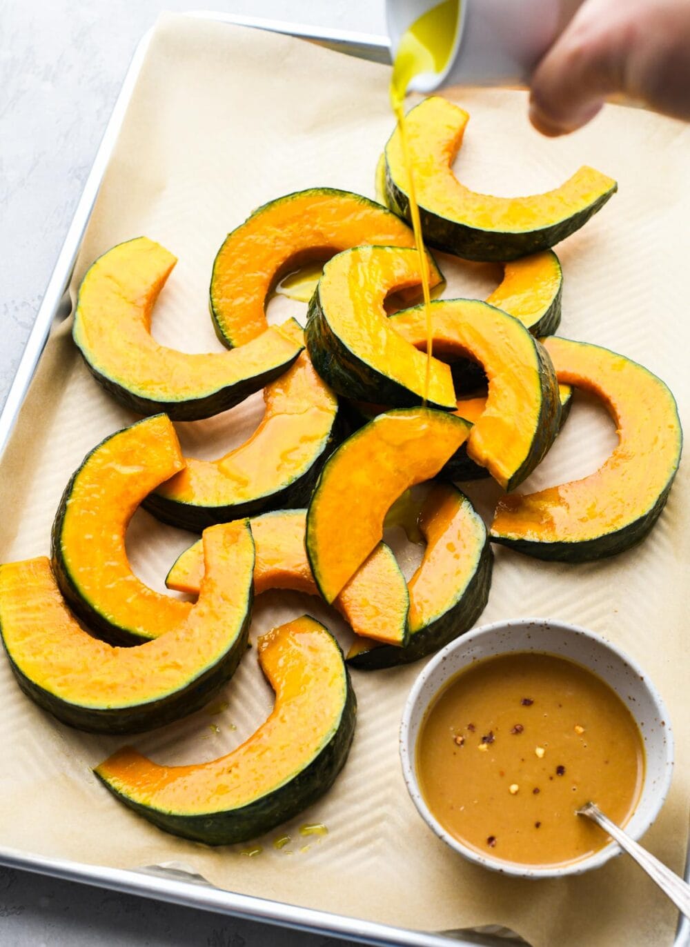 kabocha squash wedges on a sheet pan