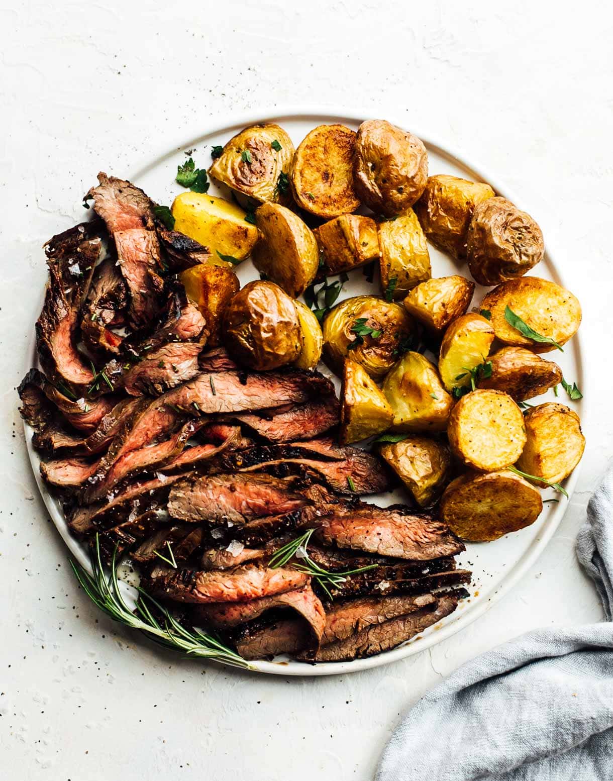 marinated grilled flank steak with roasted potatoes