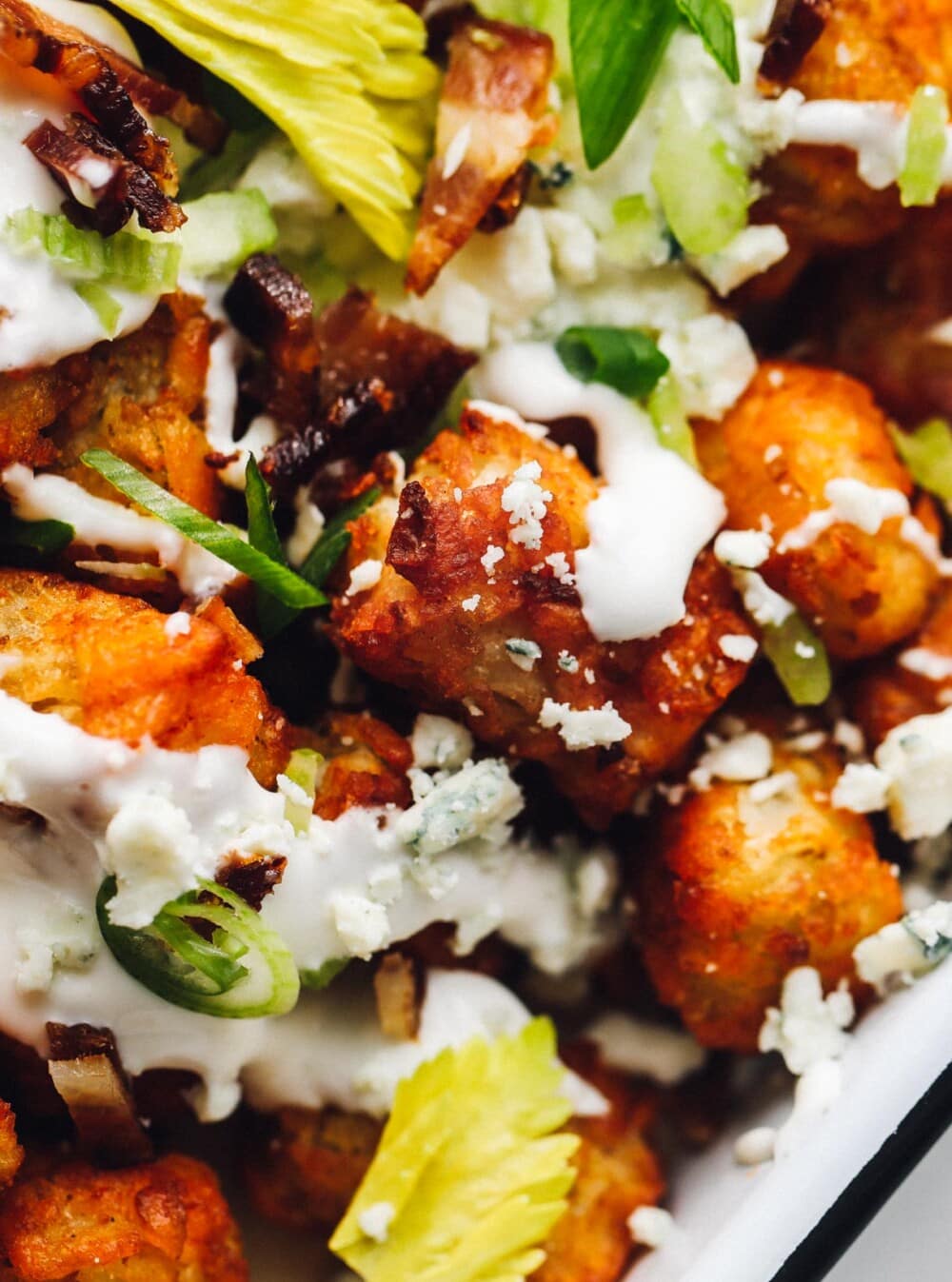 buffalo tater tots with blue cheese and green onions