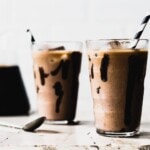 iced mocha in a clear glass with straw