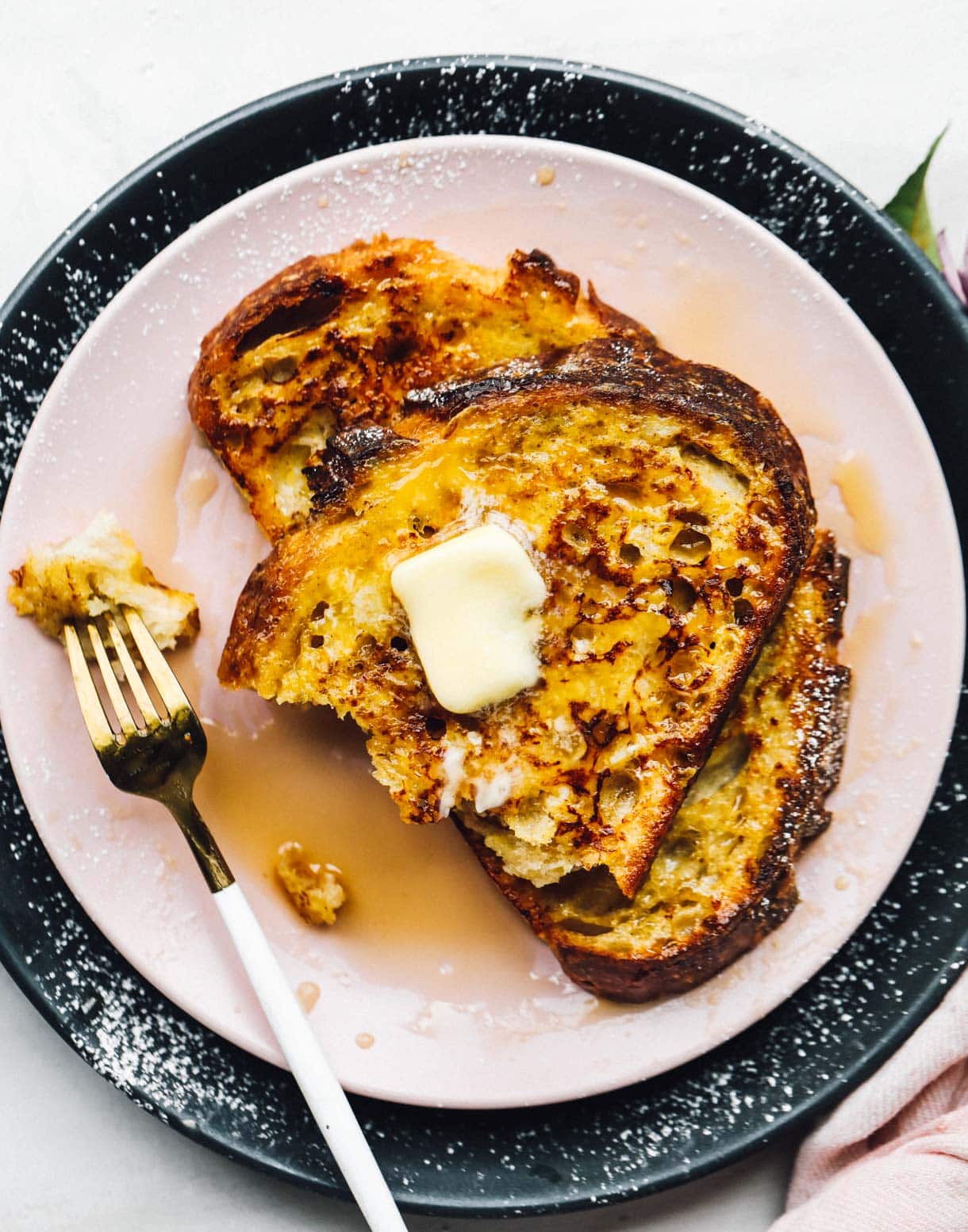best sourdough french toast on pink plate