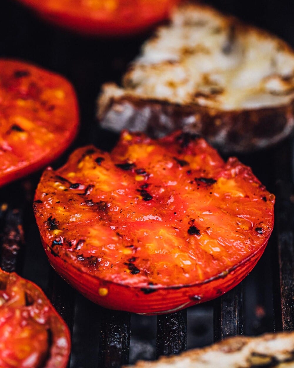 tomatoes on a grill, with char marks