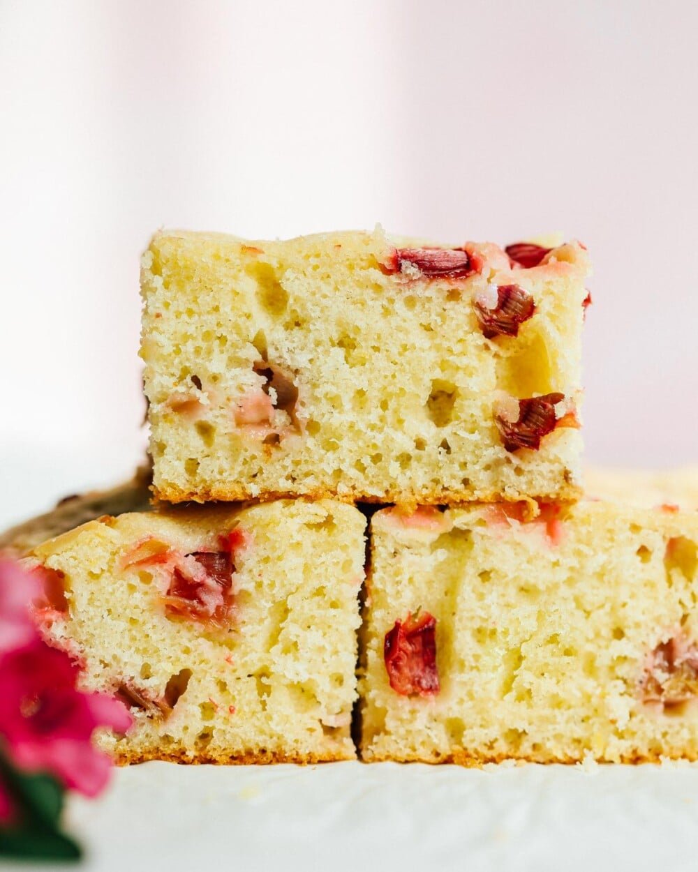 rhubarb cake slices stacked on one another