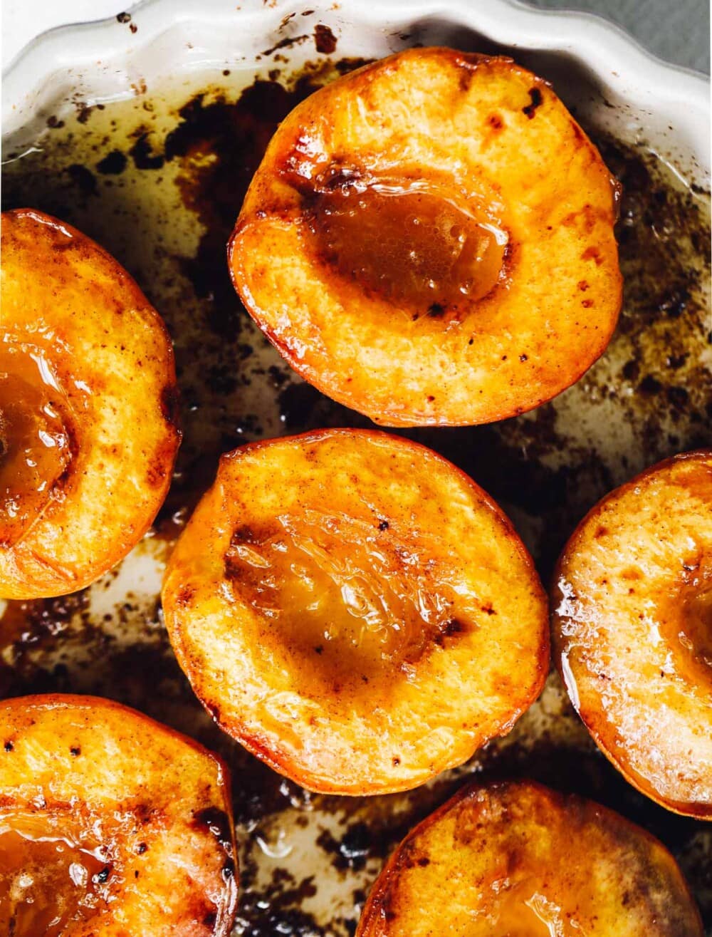 baked peaches in a pan