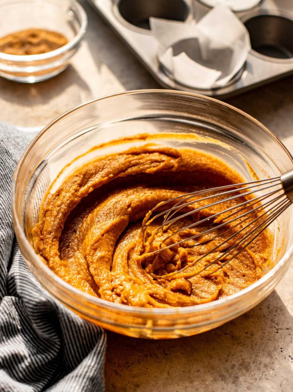 pumpkin muffin batter in a bowl