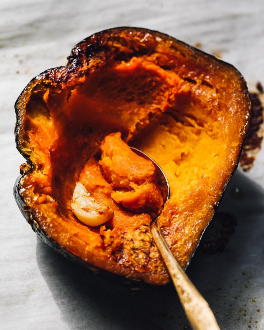 roasted buttercup squash on parchment paper