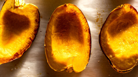 roasted carnival squash on parchment paper