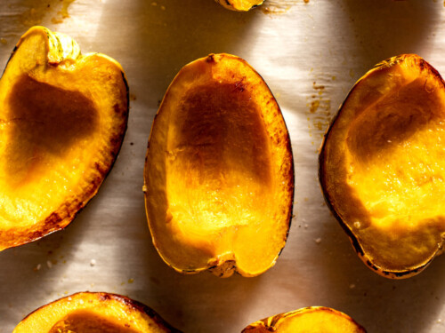 roasted carnival squash on parchment paper