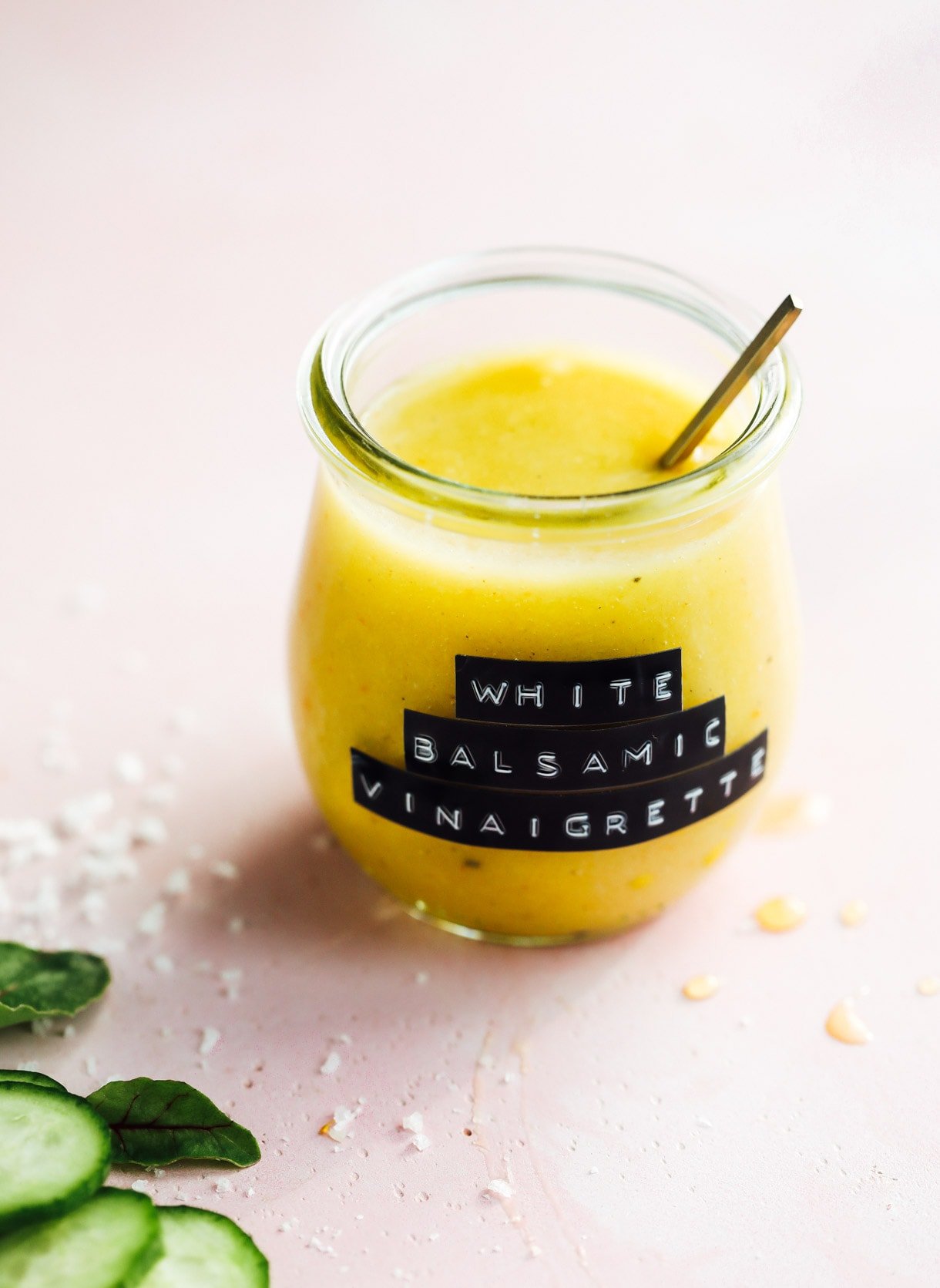 white balsamic vinaigrette in a glass jar with spoon