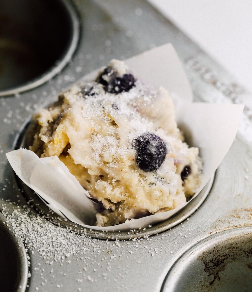 gluten-free blueberry muffin batter in tin
