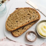 einkorn sourdough bread on white cutting board
