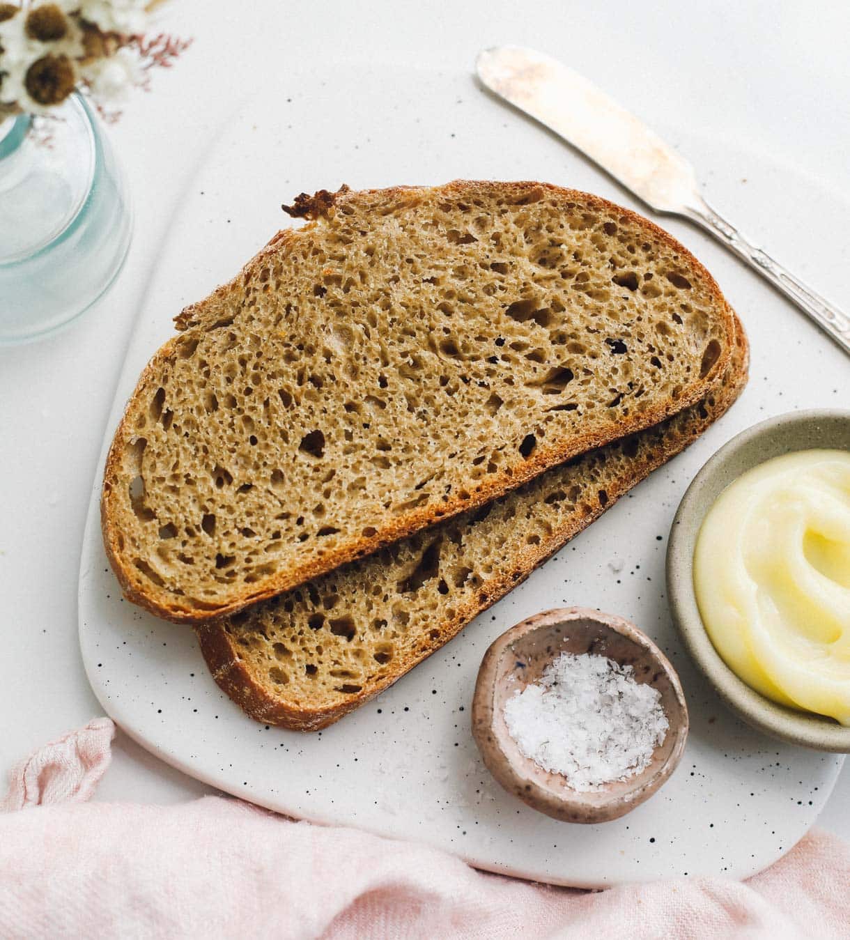 einkorn sourdough bread on white cutting board