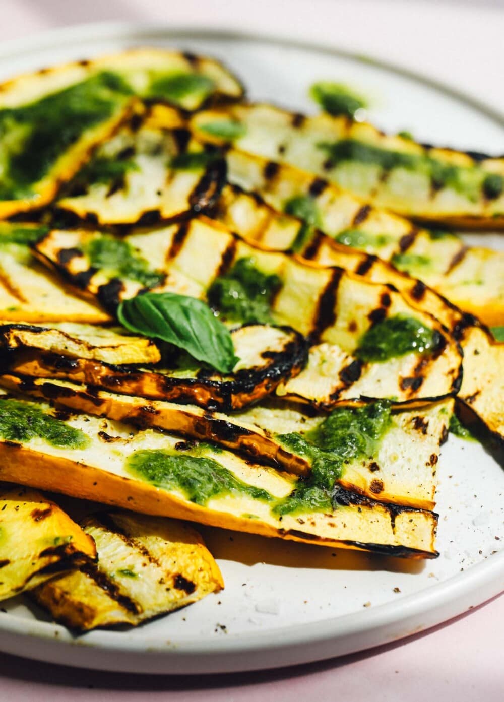 grilled summer squash on white plate