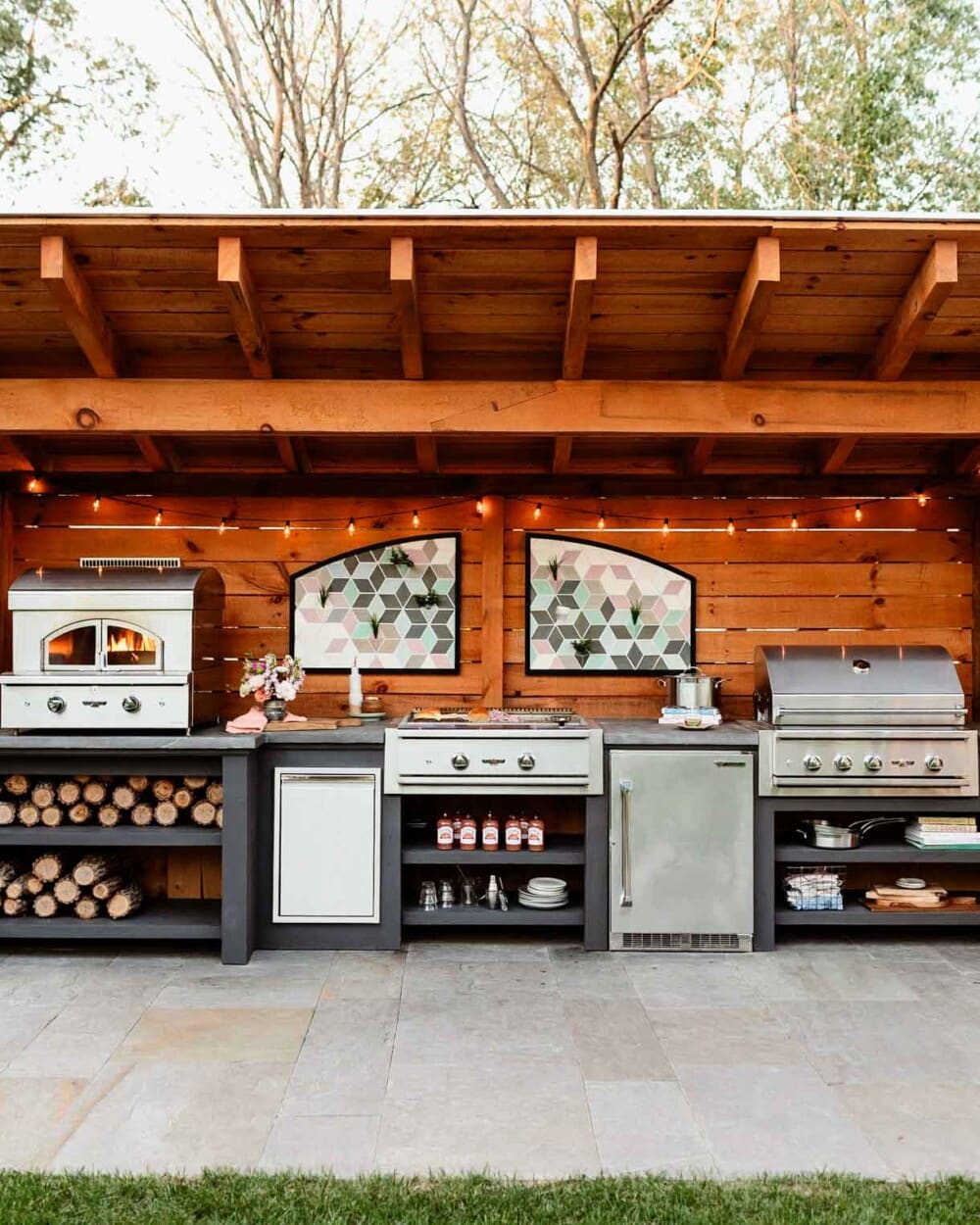 beautiful covered outdoor kitchen made from wood