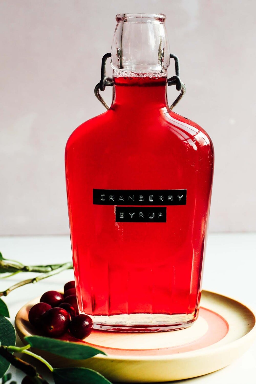 fresh cranberry syrup in a bottle