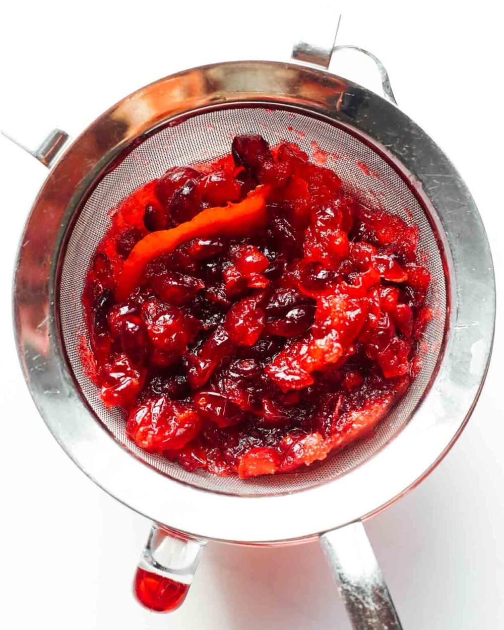 making cranberry syrup with a strainer