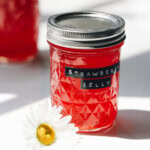 strawberry jelly in a quilted mason jar