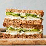 pickle sandwich on wheat bread, stacked