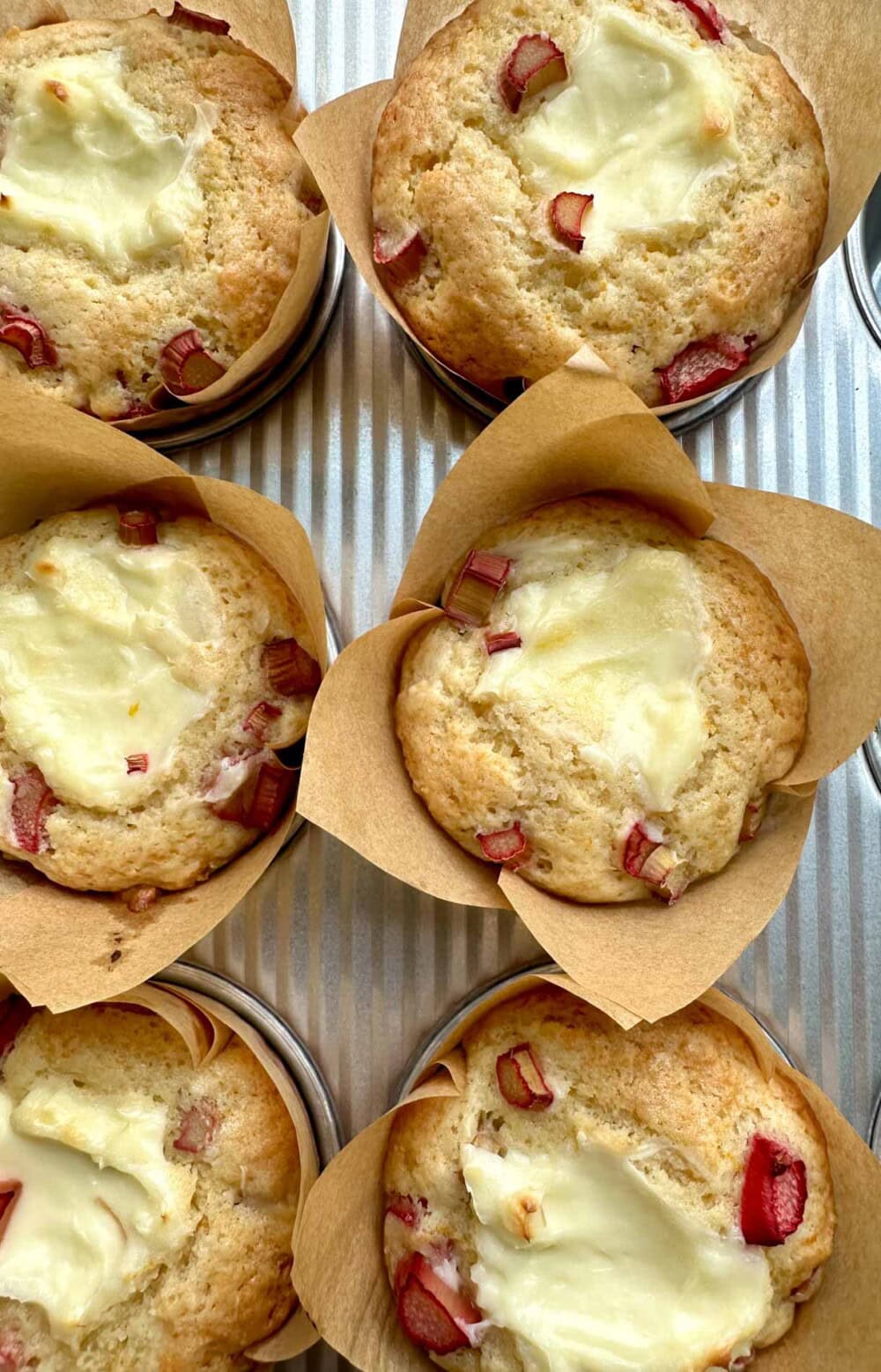 rhubarb cream cheese muffins in a pan