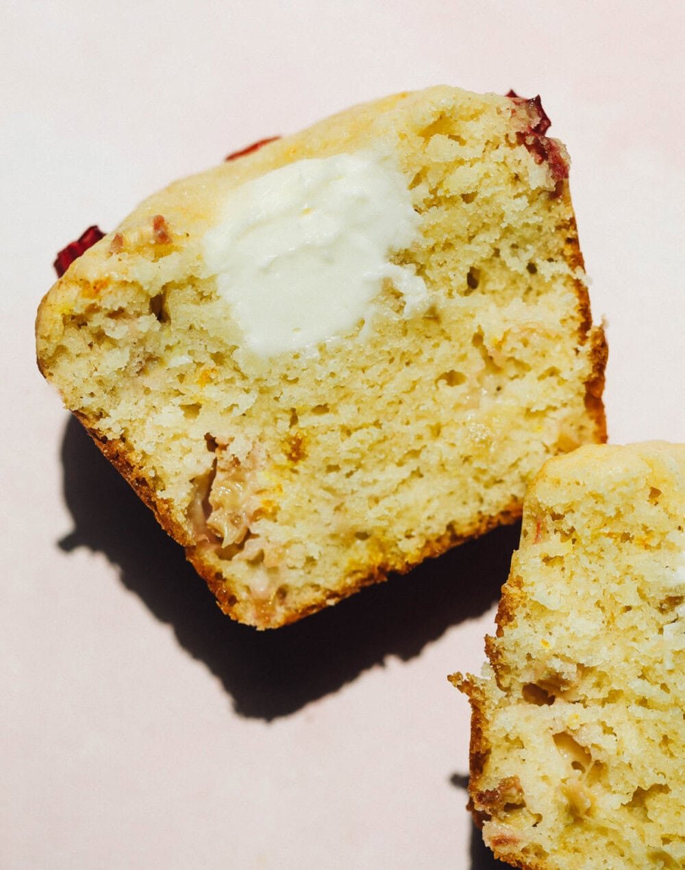 cream cheese rhubarb muffins cut in half