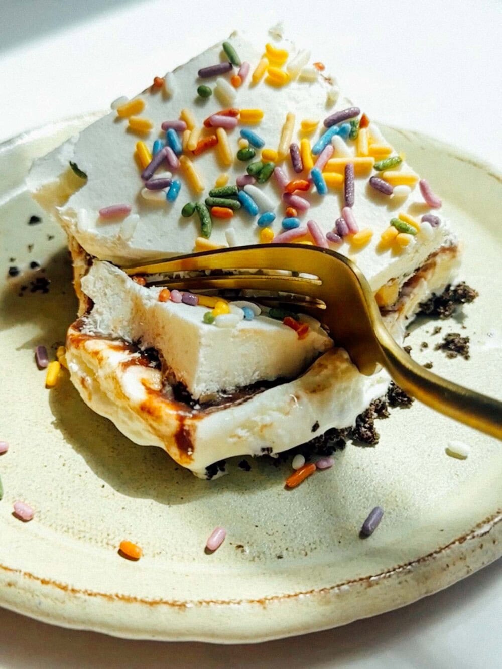 ice cream cake with a bite out of it