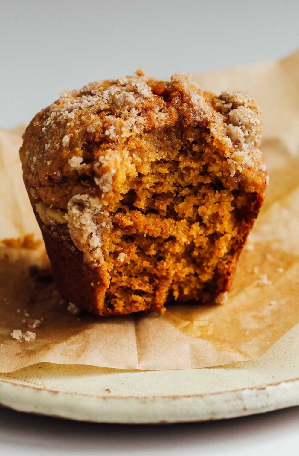 a bite out of sourdough muffin