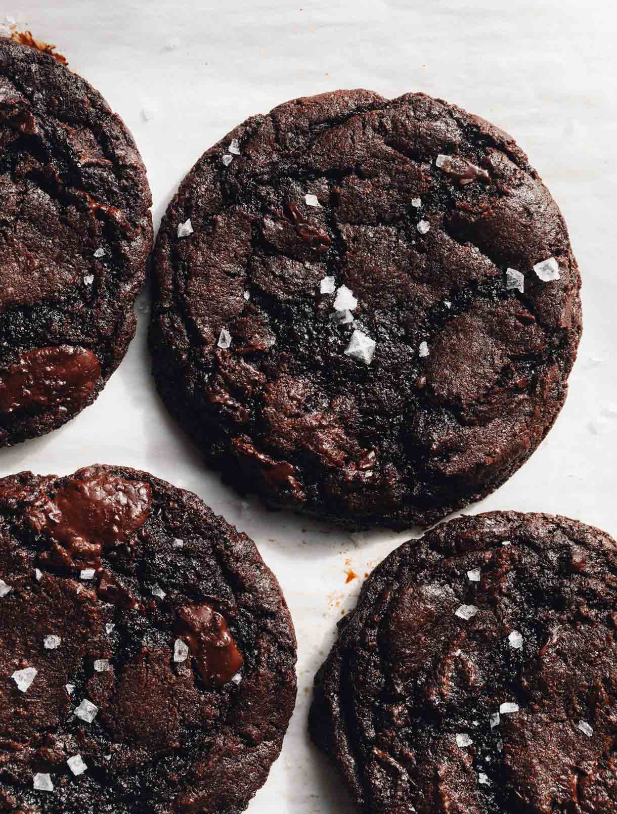 sourdough chocolate cookies on parchment paper
