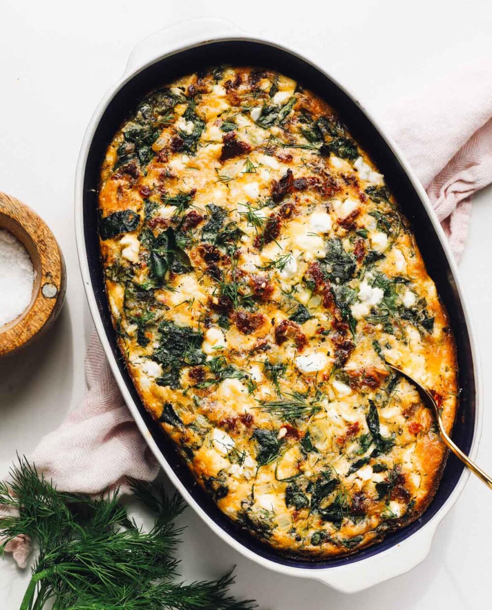 Delicious baked egg dish with sun-dried tomatoes, cottage cheese, and fresh herbs. Perfect for brunch.