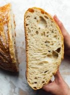 crumb shot of sourdough bread, holding in hands