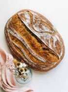 einkorn sourdough bread on a white counter