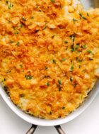 baked corn with cornflake topping in casserole dish
